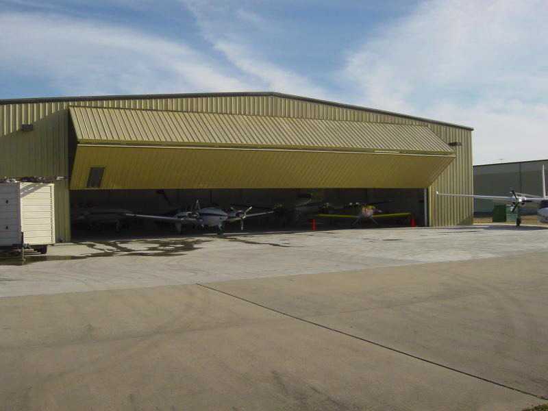 70x120 tan Aviation Bifold Hangar located in Septlles-Quebec, Canada