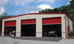 Red & Tan Steel Building Garage